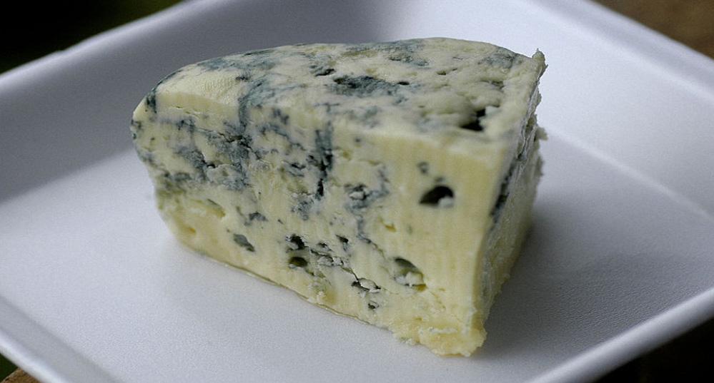 block of gorgonzola blue cheese for homemade pizza