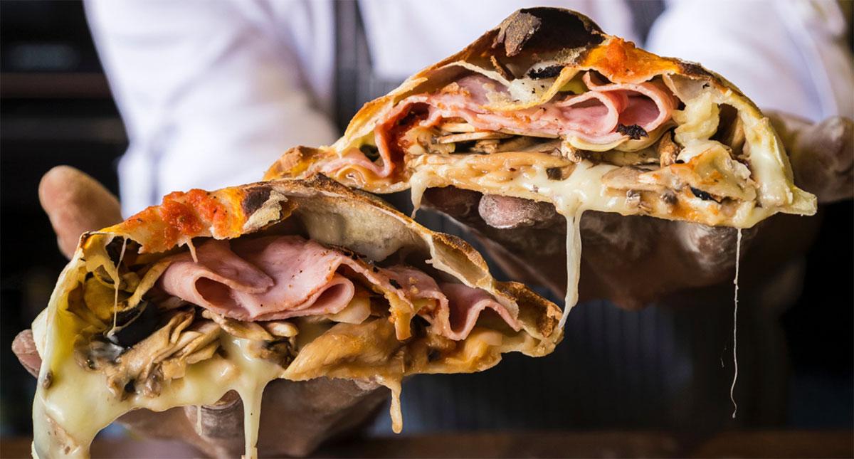are calzones pizza - dripping cheese
