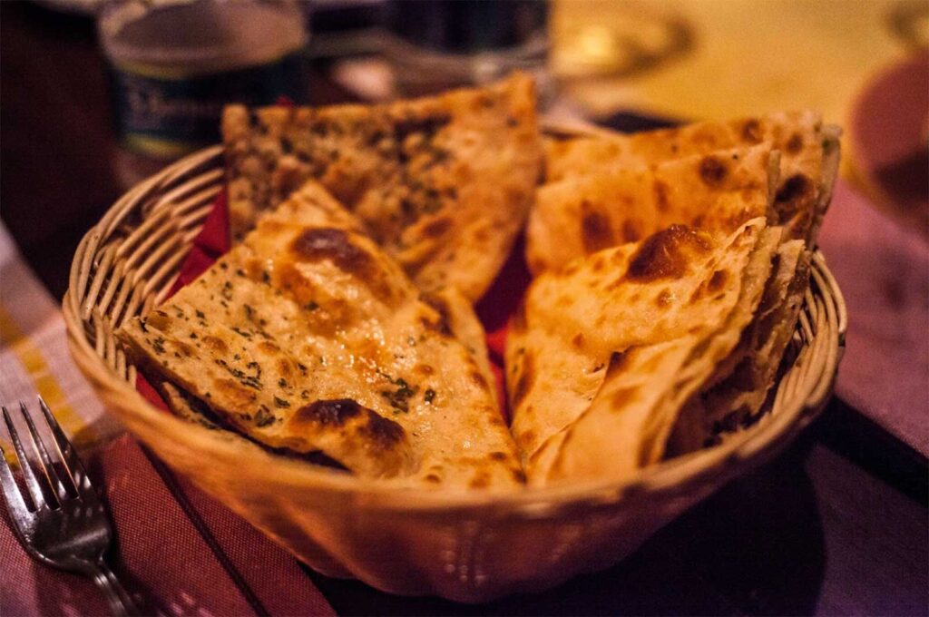 pizza with naan in a basket