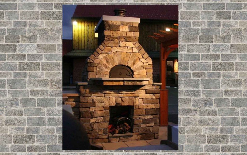 diy brick pizza oven at night