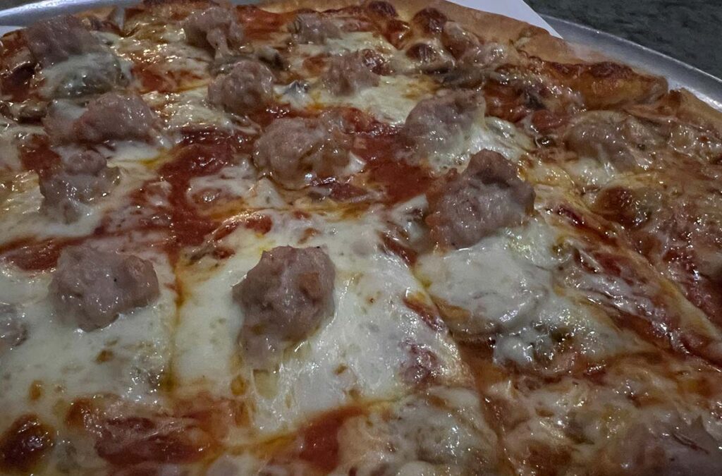 minnesota style pizza with one sausage per square