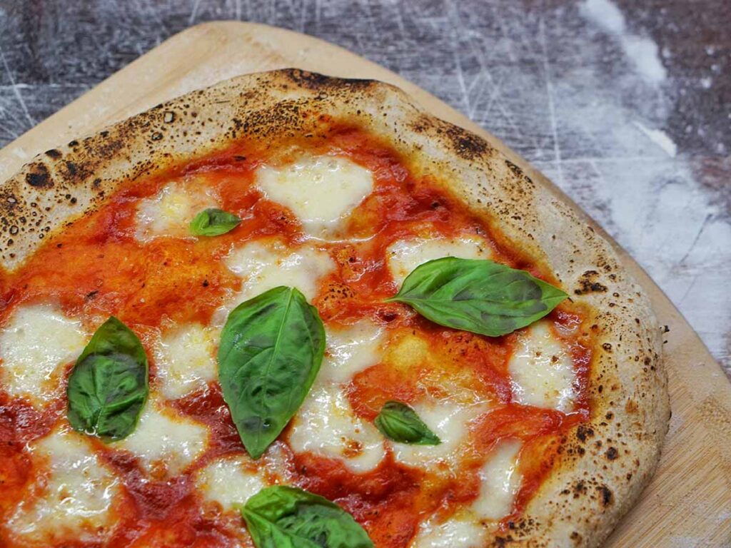 fresh organic basil on homemade pizza