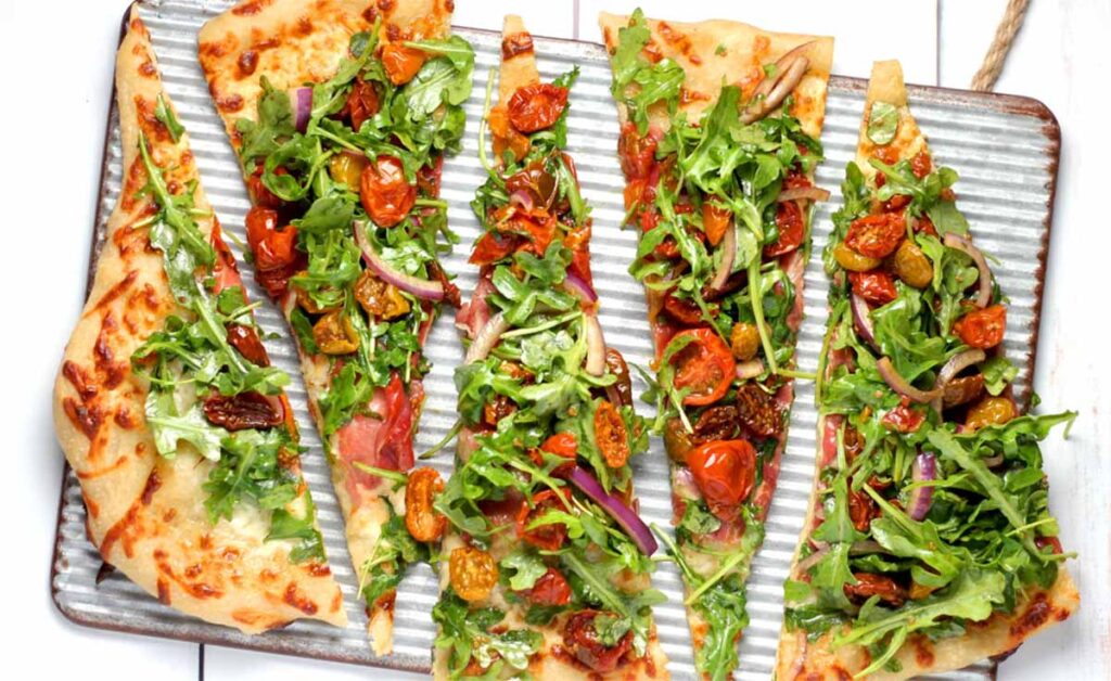 salad on pizza - five fresh slices